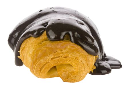 Croissants in chocolate isolated on a white background close-up.の写真素材