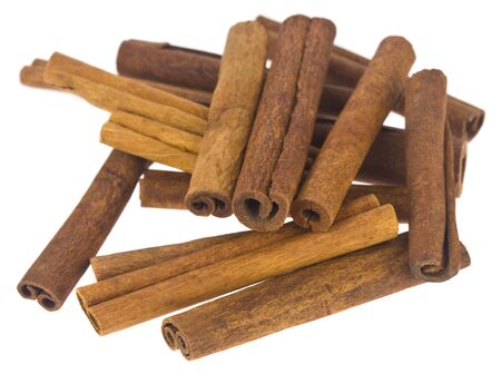 Cinnamon sticks isolated on a white background close-up.の写真素材