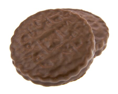 Chocolate cookies isolated on a white background close-up.の写真素材