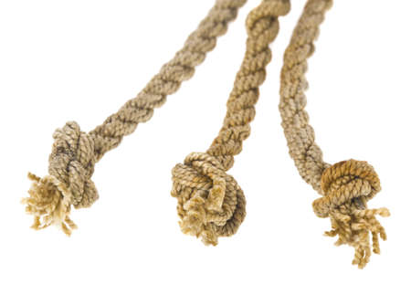 Rope with knots isolated on white background close-up.の写真素材