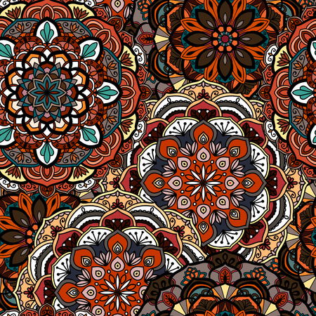 Seamless ethnic pattern with floral motives. Mandala stylized print template for fabric and paper. Indian or Arabic motive. Boho festival style.のイラスト素材