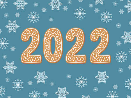 Christmas background with 2022 text composed of traditional gingerbread cookies and snowflakes....