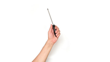 Male hand holding a screwdriver on a white background