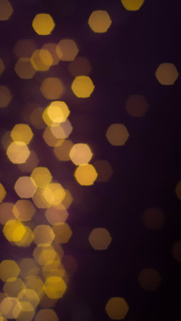Blurred festive background with golden bokeh