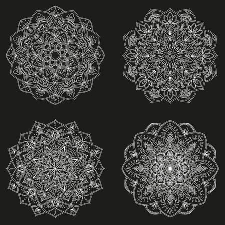 Collection of white mandalas isolated on a dark background. vintage decorative elements. Outline hand drawn. vector illustrationのイラスト素材