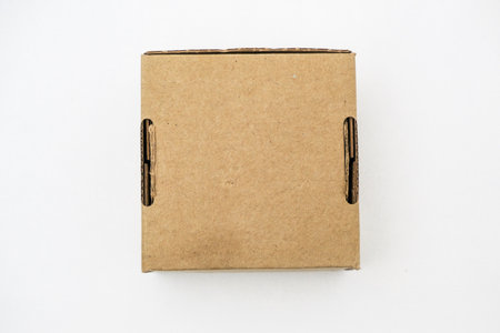 Brown cardboard box on a white background