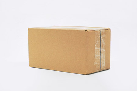 Brown cardboard box on a white background