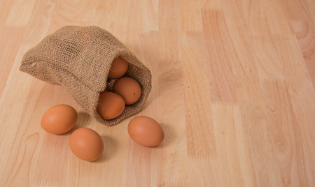 Eggs on wooden backgroundの写真素材
