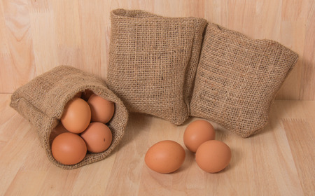 Eggs on wooden backgroundの写真素材