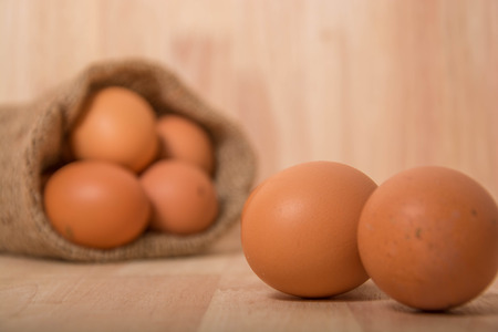Eggs on wooden backgroundの写真素材