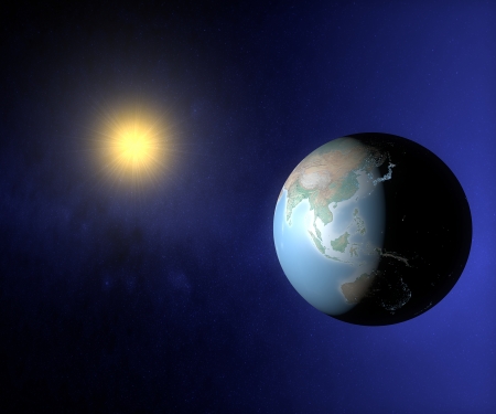 World globe map in the space with sun and city lights, Asia and Australiaの写真素材