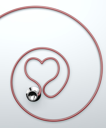 Stethoscope, instrument cardiac auscultation. Stethoscope resting on a plane, in the shape of heartの写真素材