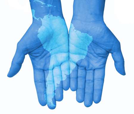 Hands with South America, South America map drawn. The world in your handの写真素材