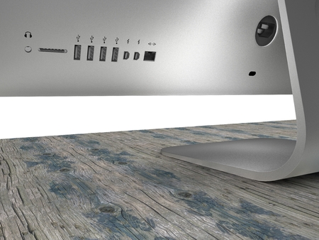 A computer seen from behind on a wooden table. Cables input. 3d renderingの写真素材