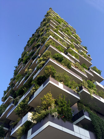 Vertical Forest, Milan, Porta Nuova skyscraper residences, Italy, April 15, 2016. View of the balconies and terraces of the Vertical Forest, full of green plantsのeditorial素材