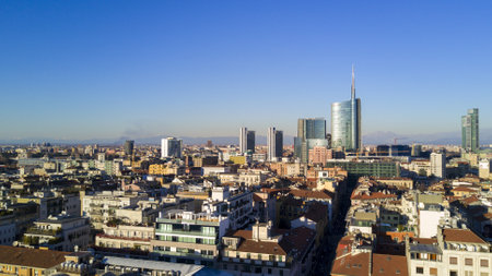 Aerial view of the center of Milan, panoramic view of Milan, Porta Nuova residences and skyscrapers, Italy, Jan. 6, 2017. New Milan skyline, aerial view from Porta Nuova and the Island District. Milan aerial view of 360 degrees. Buildings houses roofs andのeditorial素材