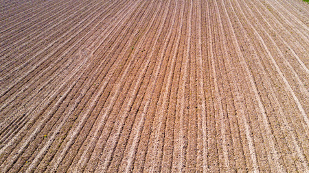 Nature and landscape, Aerial view of a field cultivation at countrysideの写真素材