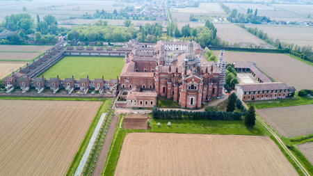 Aerial view of the Certosa di Pavia, built in the late fourteenth century, courts and the cloister of the monastery and shrine in the province of Pavia, Lombardia, Italy.の写真素材