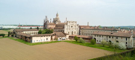 Aerial view of the Certosa di Pavia, built in the late fourteenth century, courts and the cloister of the monastery and shrine in the province of Pavia, Lombardia, Italy.の写真素材