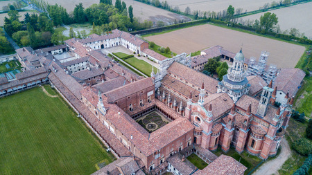 Aerial view of the Certosa di Pavia, built in the late fourteenth century, courts and the cloister of the monastery and shrine in the province of Pavia, Lombardia, Italy.の写真素材