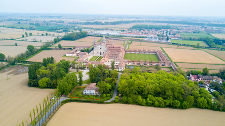Aerial view of the Certosa di Pavia, built in the late fourteenth century, courts and the cloister of the monastery and shrine in the province of Pavia, Lombardia, Italy.の写真素材