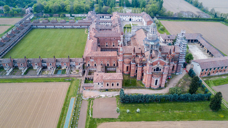 Aerial view of the Certosa di Pavia, built in the late fourteenth century, courts and the cloister of the monastery and shrine in the province of Pavia, Lombardia, Italy.の写真素材
