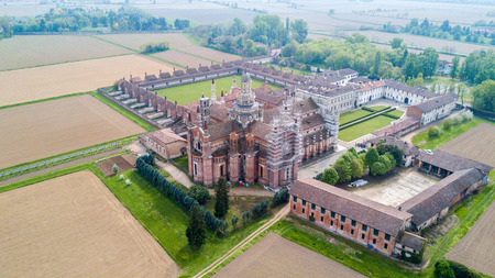 Aerial view of the Certosa di Pavia, built in the late fourteenth century, courts and the cloister of the monastery and shrine in the province of Pavia, Lombardia, Italy.の写真素材