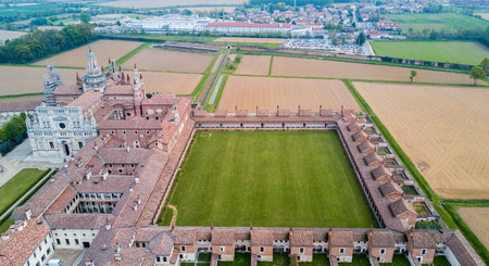 Aerial view of the Certosa di Pavia, built in the late fourteenth century, courts and the cloister of the monastery and shrine in the province of Pavia, Lombardia, Italy.の写真素材