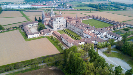 Aerial view of the Certosa di Pavia, built in the late fourteenth century, courts and the cloister of the monastery and shrine in the province of Pavia, Lombardia, Italy.の写真素材