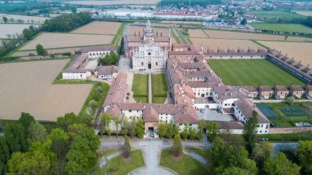 Aerial view of the Certosa di Pavia, built in the late fourteenth century, courts and the cloister of the monastery and shrine in the province of Pavia, Lombardia, Italy.の写真素材