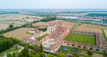 Aerial view of the Certosa di Pavia, built in the late fourteenth century, courts and the cloister of the monastery and shrine in the province of Pavia, Lombardia, Italy.の写真素材