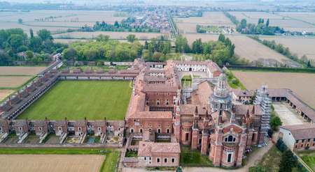 Aerial view of the Certosa di Pavia, built in the late fourteenth century, courts and the cloister of the monastery and shrine in the province of Pavia, Lombardia, Italy.の写真素材