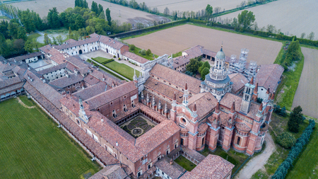 Aerial view of the Certosa di Pavia, built in the late fourteenth century, courts and the cloister of the monastery and shrine in the province of Pavia, Lombardia, Italy.の写真素材