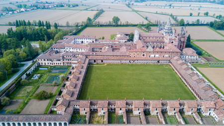 Aerial view of the Certosa di Pavia, built in the late fourteenth century, courts and the cloister of the monastery and shrine in the province of Pavia, Lombardia, Italy.の写真素材
