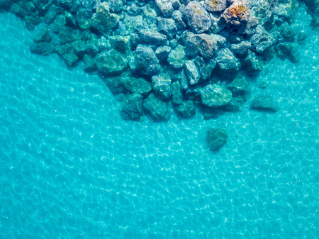 Aerial view of the rocks on the sea. Overview of the seabed seen from above, transparent waterの写真素材