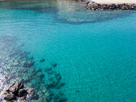 Aerial view of the rocks on the sea. Overview of the seabed seen from above, transparent waterの写真素材