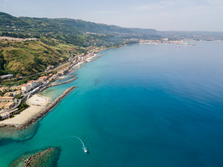 Aerial View of Pizzo Calabro, Calabria, Italy. Houses on rock, harbor and pier with moored boatsのeditorial素材