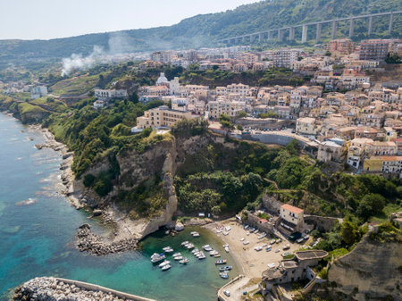 Aerial View of Pizzo Calabro, Calabria, Italy. Houses on rock, harbor and pier with moored boats.のeditorial素材