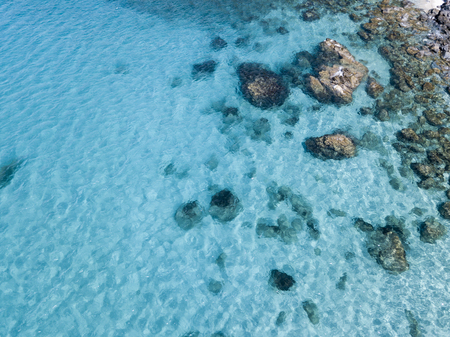 Aerial view of the rocks on the sea. Overview of the seabed seen from above, transparent waterの写真素材