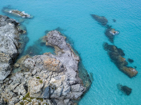 Aerial view of the rocks on the sea. Overview of the seabed seen from above, transparent waterの写真素材
