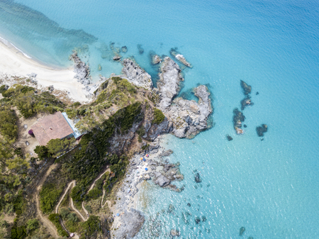 Paradise of the sub, beach with promontory overlooking the sea. Zambrone, Calabria, Italy. Diving relaxation and summer vacationsの写真素材