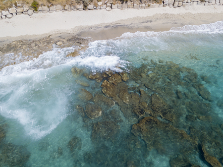 Aerial view of the rocks on the sea. Overview of the seabed seen from above, transparent waterの写真素材