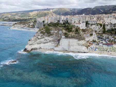 Aerial view of Tropea, house on the rock and Sanctuary of Santa Maria dell'Isola, Calabria. Italy. Tourist destinations of the most famous in Southern Italy, seaside resort located on a cliff in the gulf of Sant'Eufemiaの写真素材