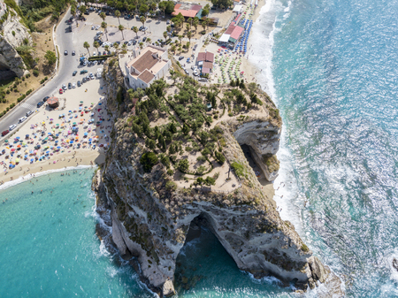 Aerial view of Tropea, house on the rock and Sanctuary of Santa Maria dell'Isola, Calabria. Italy. Tourist destinations of the most famous in Southern Italy, seaside resort located on a cliff in the gulf of Sant'Eufemiaの写真素材