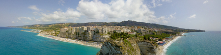 Aerial view of Tropea, house on the rock and Sanctuary of Santa Maria dell'Isola, Calabria. Italy. Tourist destinations of the most famous in Southern Italy, seaside resort located on a cliff in the gulf of Sant'Eufemiaの写真素材