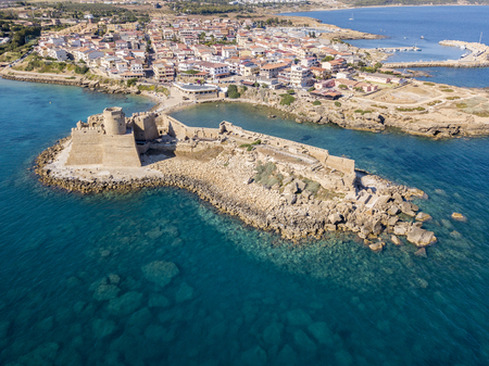 Aerial view of the Aragonese castle of Le Castella, Le Castella, Calabria, Italy: the Ionian Sea, built on a small strip of land overlooking the Saracens Coast in the hamlet of Isola Capo Rizzutoの写真素材