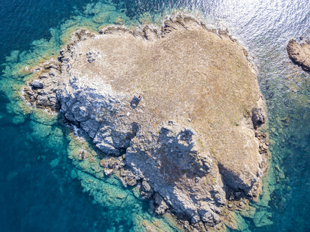 Aerial view of the islands of Finocchiarola, Mezzana, Earth, Peninsula of Cap Corse, Corsica. Tyrrhenian Sea, Uninhabited Islands that are part of the municipality of Rogliano. France.の写真素材