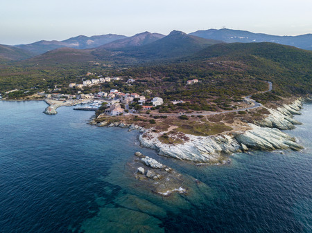 Aerial view of winding roads of the French coast. Barcaggio. Cap Corse Peninsula, the northernmost point of Cap Corse, in front of the island of Giraglia. Corsica. Coastline. franceの写真素材