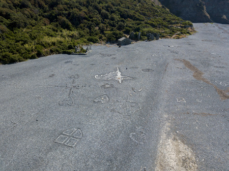 Aerial view of black stone beach, Nonza, geometric designs made with stones. Cap Corse Peninsula, Corsica. Coastline. franceの写真素材