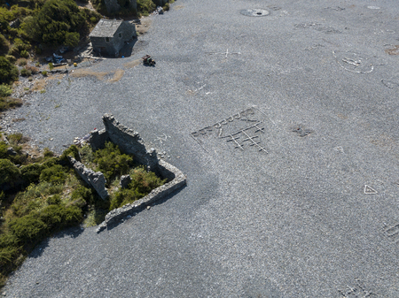 Aerial view of black stone beach, Nonza, geometric designs made with stones. Yin and Yang. Cap Corse Peninsula, Corsica. Coastline. franceの写真素材